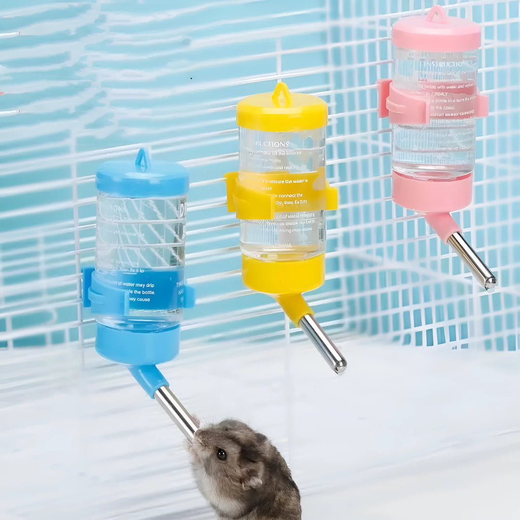 Green plastic ball kettle pet water feeder with leak-proof design attached to a small animal cage.
