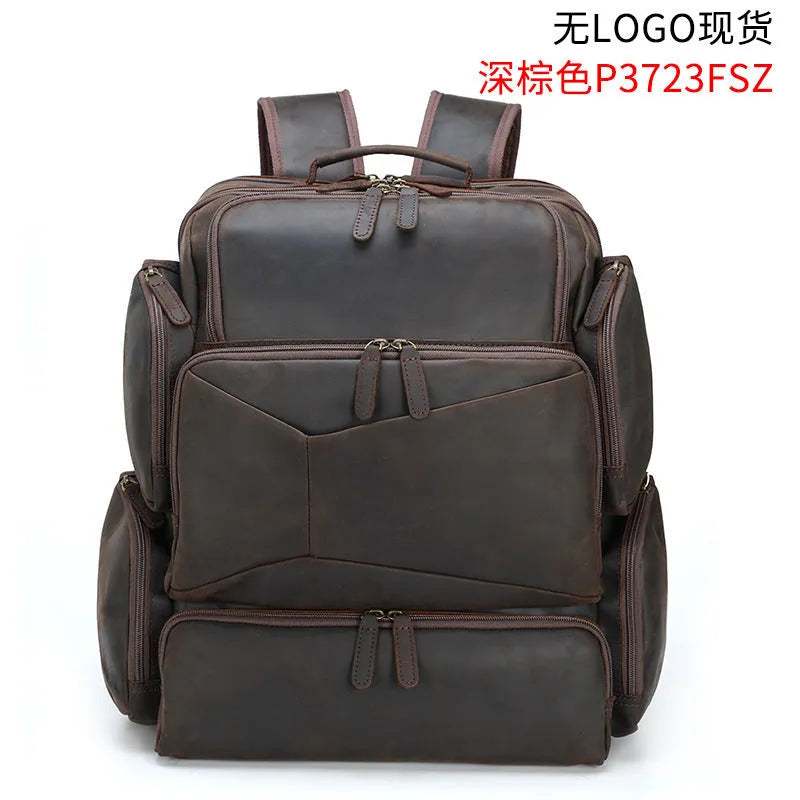 Dark brown retro leather backpack for a 17-inch laptop with double shoulder straps.