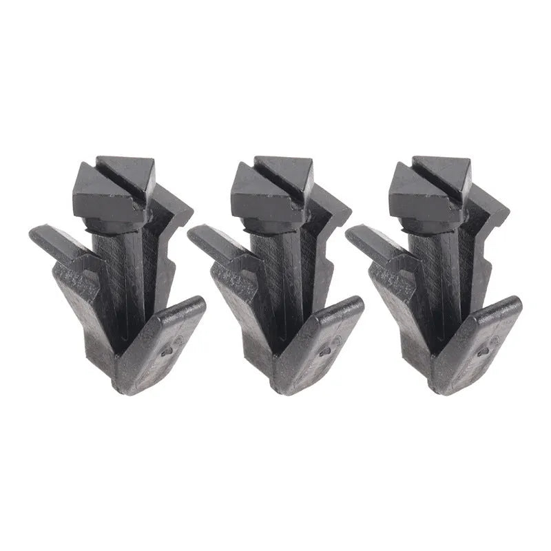 Black plastic Nissan bumper and grille fastening clip, model 76882-0M060.