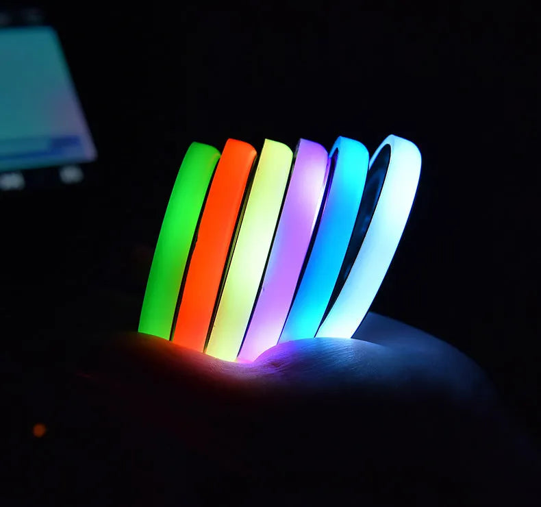 Colourful LED light-up coaster for car cup holder with USB cable and seven light colours.
