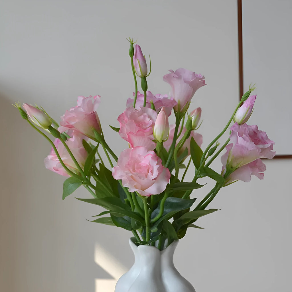 Artificial silk eustoma flower with 3 heads in beige colour, 22cm total length, on white background