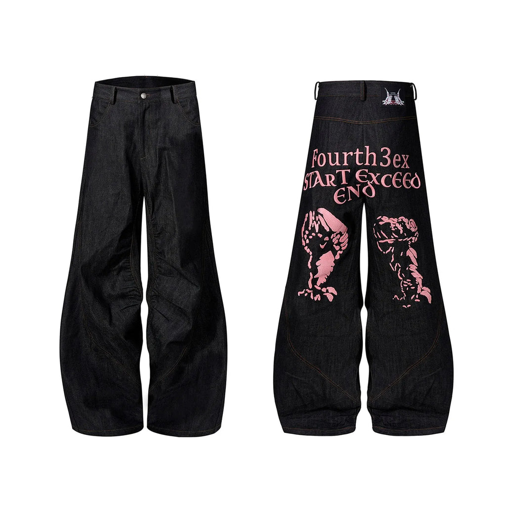 Black wide leg jeans with colour-changing temperature-sensitive embroidery and red ear detailing on a hanger.