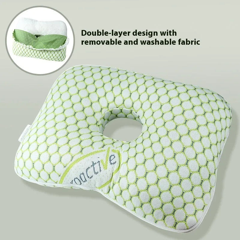 Beauty salon single hole ear pillow in Boer Grey colour on a treatment bed.