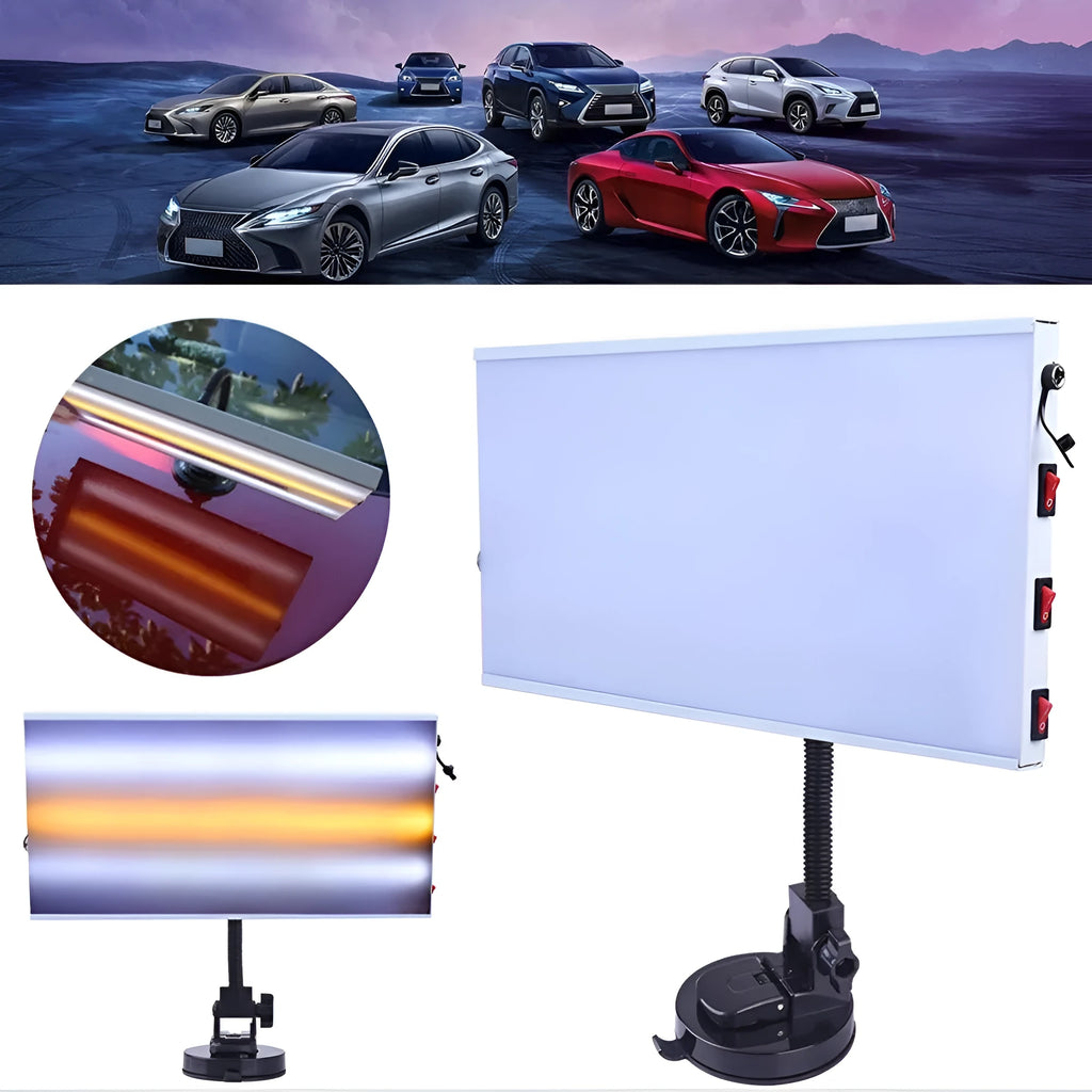 White car dent repair detector kit with concave inspection light on workshop bench