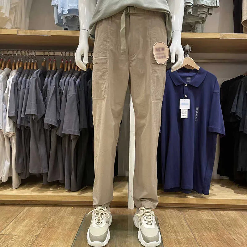Men's beige straight-leg casual trousers with a mid-waist, made from bamboo fibre fabric.