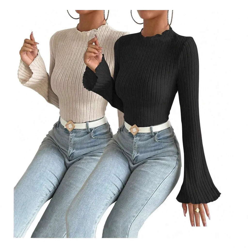 Black slim-fit long sleeve top with round neck and subtle sunken stripe pattern on soft brushed fabric.