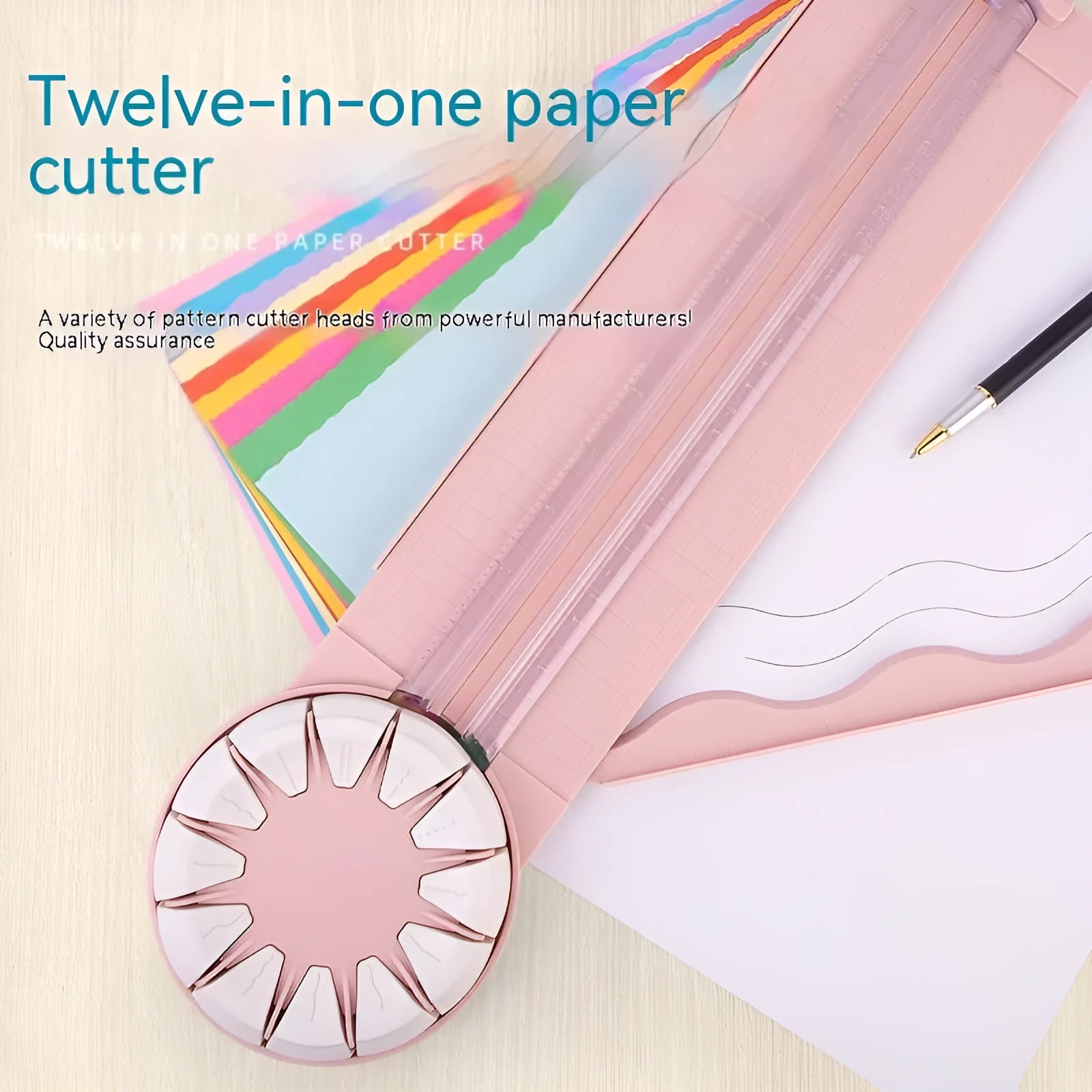 Pink and black 12-in-1 multifunctional plastic paper cutting machine on a desk