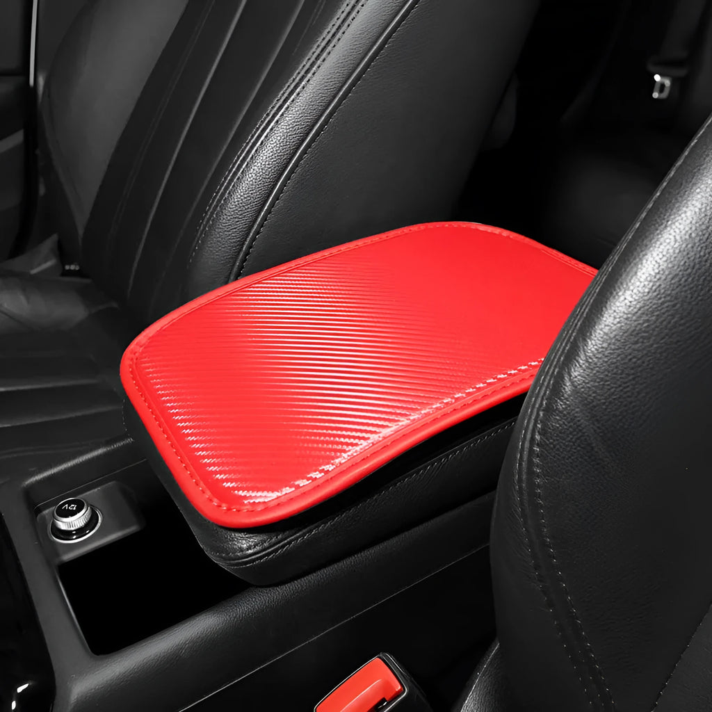 Leather car armrest box mat in black, shown on a car centre console.