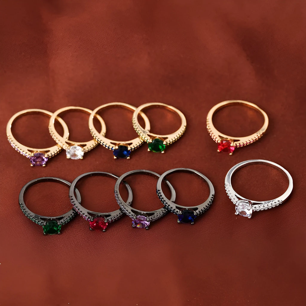 Colourful hexagonal zircon ring in copper with electroplated finish on a size 7 finger.