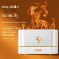 Black square USB aroma diffuser with LED flame light effect and mist output on a wooden table.