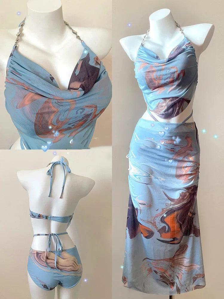 Women's blue printed triangle bikini top and skirted bottom three-piece swimsuit set with steel wire support
