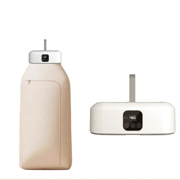 White cylindrical portable clothes dryer with remote control folded for storage