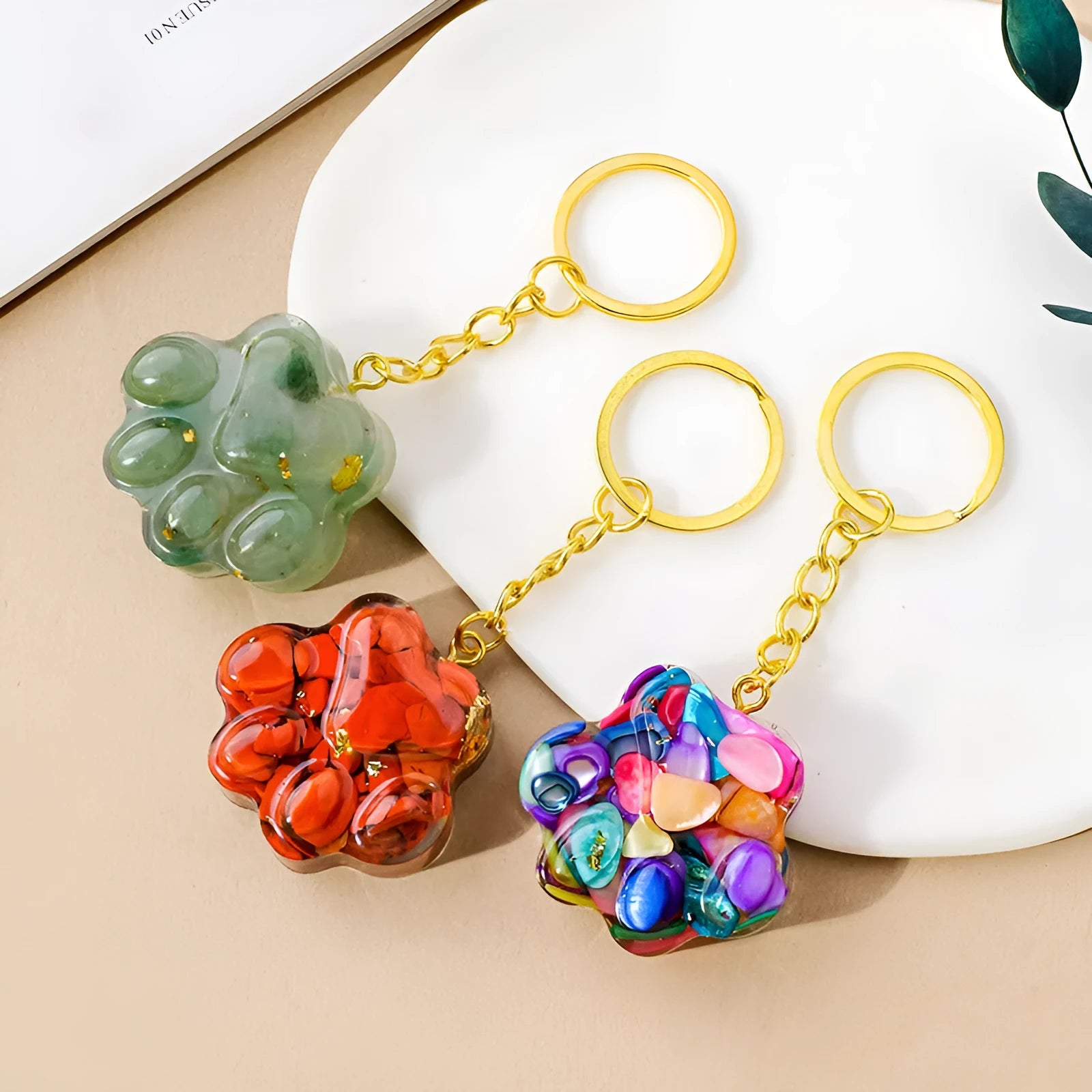 Natural crystal cat's paw keychain pendant in a chosen gemstone like turquoise or amethyst.