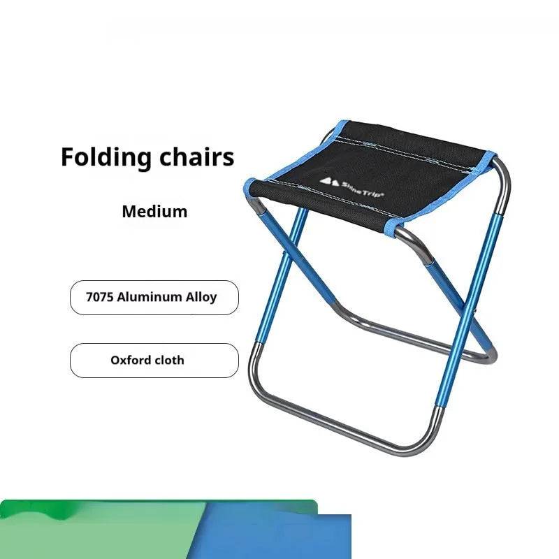 Black ethnic style aluminium alloy portable folding stool for camping and fishing.