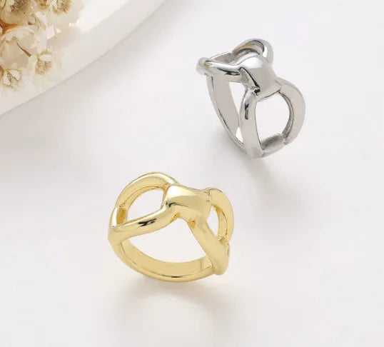 Titanium steel women's ring with butterfly hollow design in gold or steel colour with bow shape