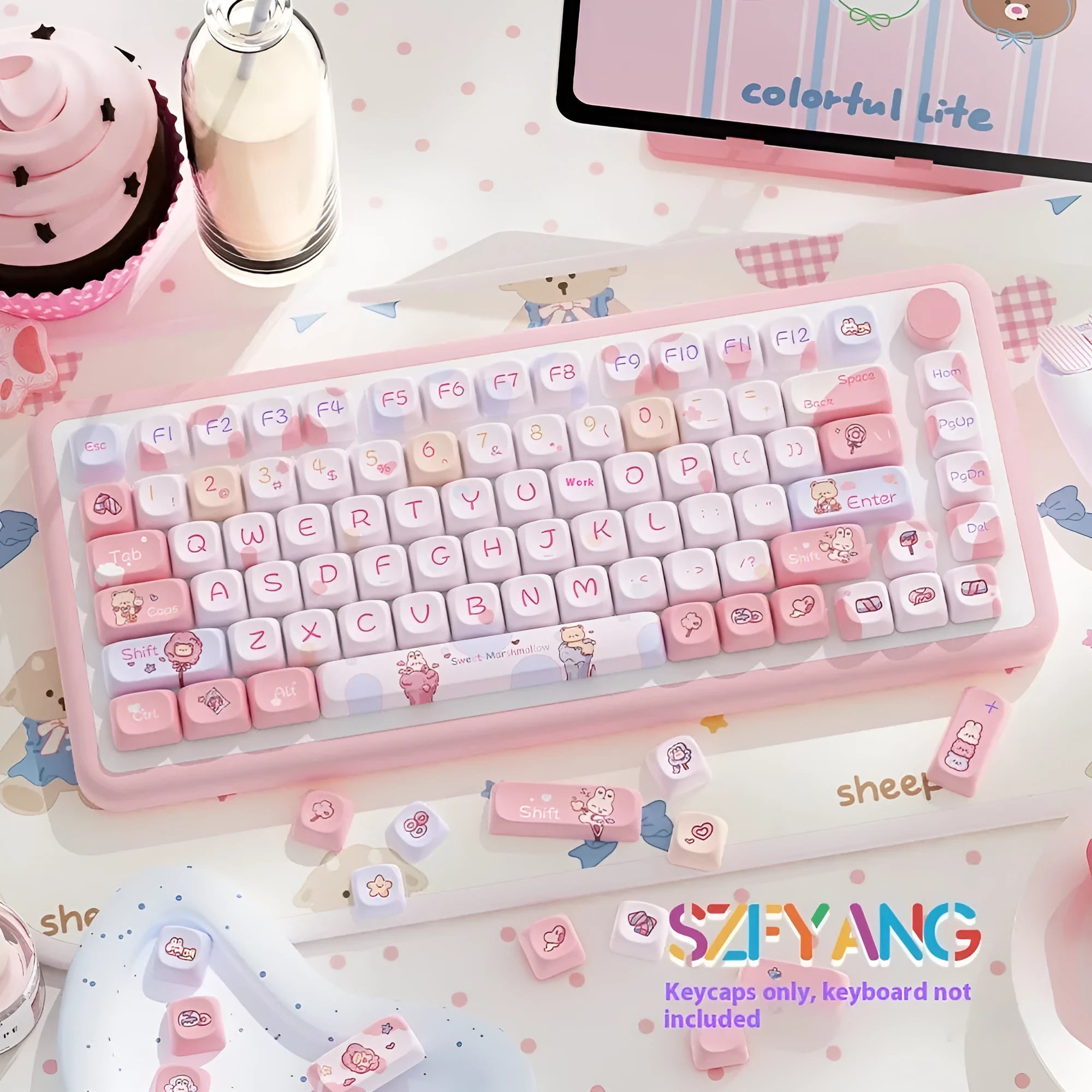 Sweet Cotton Candy pastel pink blue and white key cap set for mechanical keyboards laid out in box
