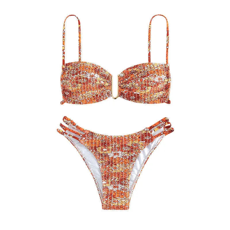 Women's floral bikini swimsuit with high-waist briefs in solid colour patterns