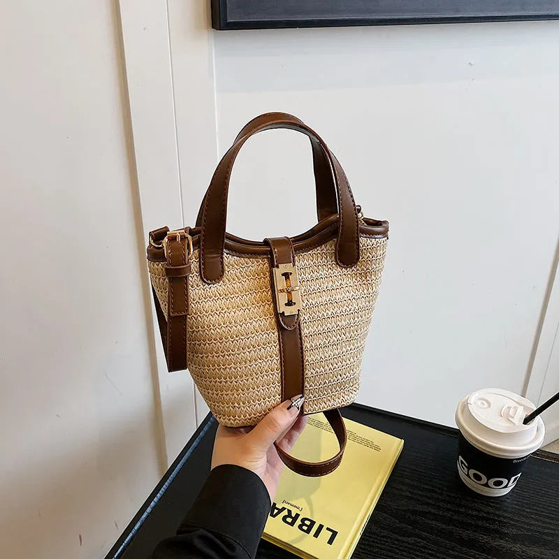 Women's bucket handbag in PU with sewing line detail, available in brown and apricot colours
