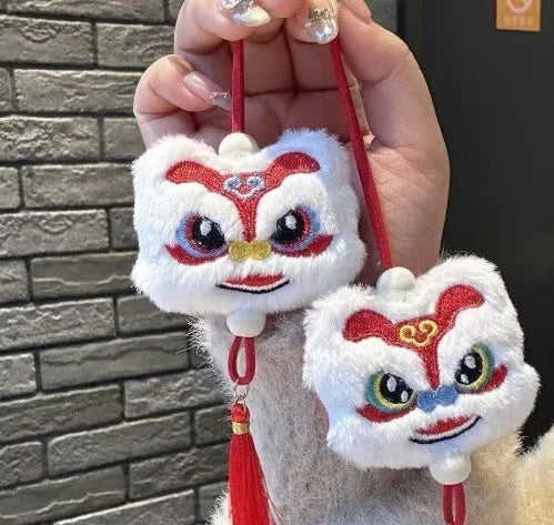 Chinese style plush lion keychain ornament with star stone detail in blue colour