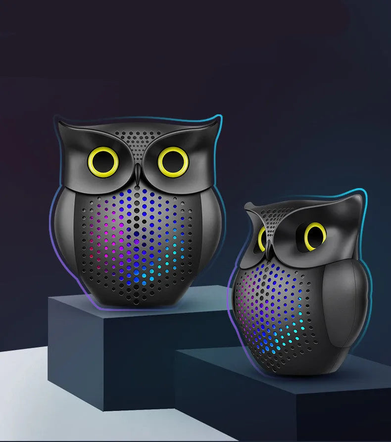 Black owl-designed wireless Bluetooth speaker with USB cable