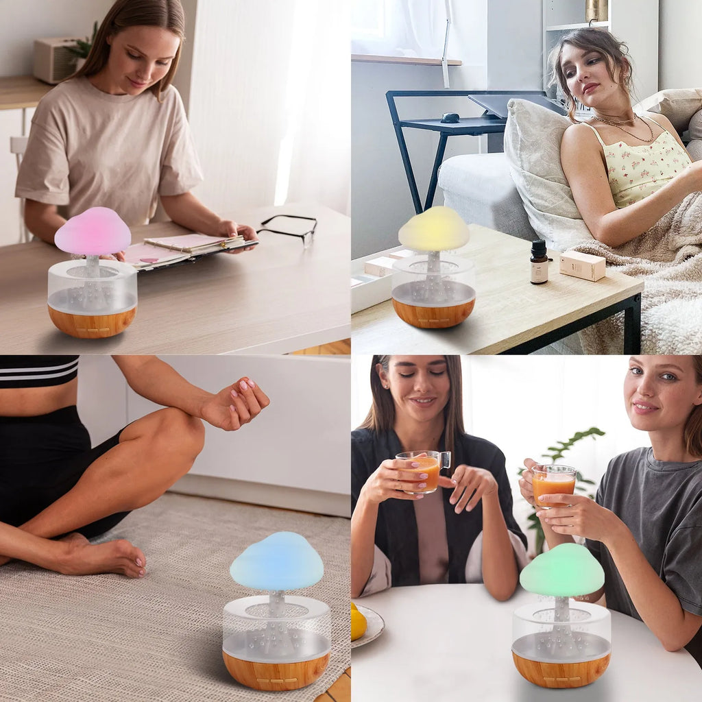 White cloud-shaped aromatherapy humidifier with colour-changing night light on a table.