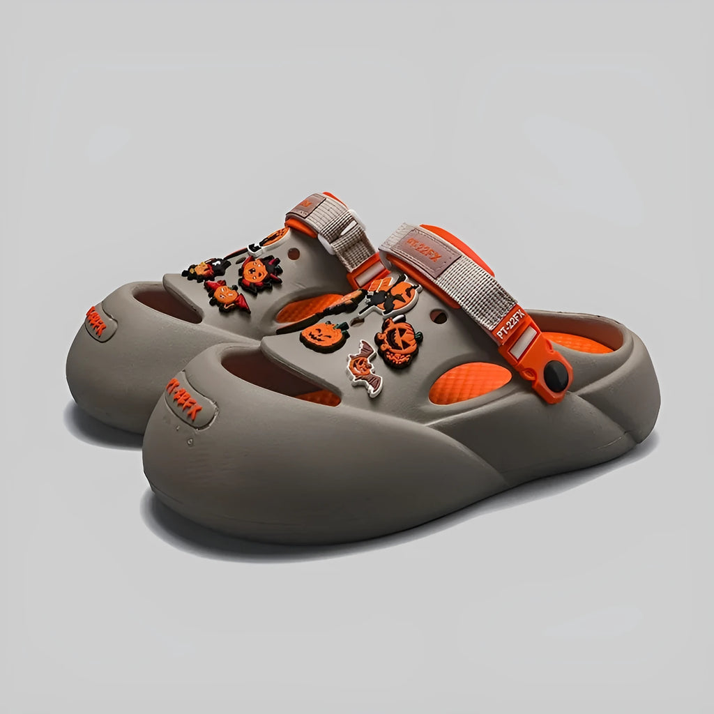 Men's grey baotou beach shoes with EVA sole and closed-toe design on a sandy background.