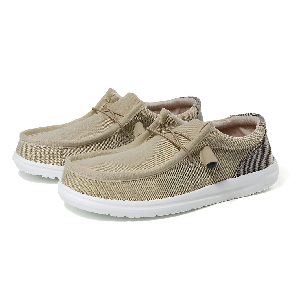 Men's green and orange canvas casual shoes with mosaic design and rubber sole.