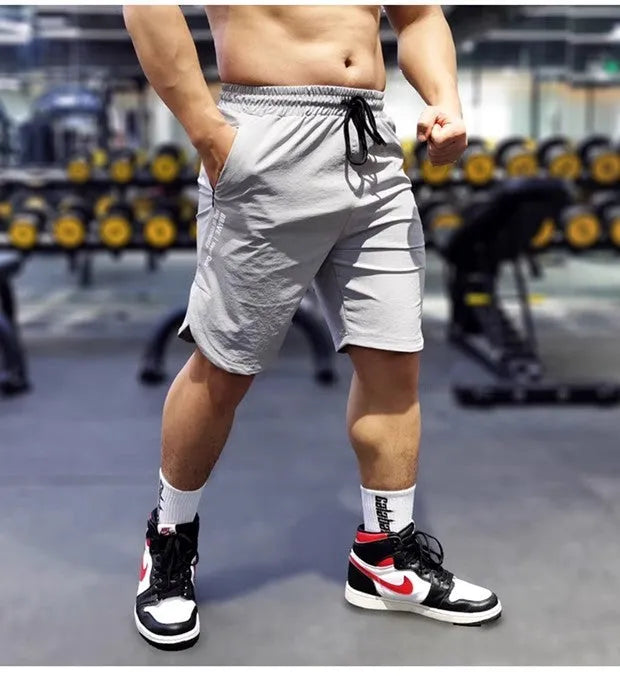 Men's black quick-drying running shorts made of thin polyamide-spandex fabric for sports.