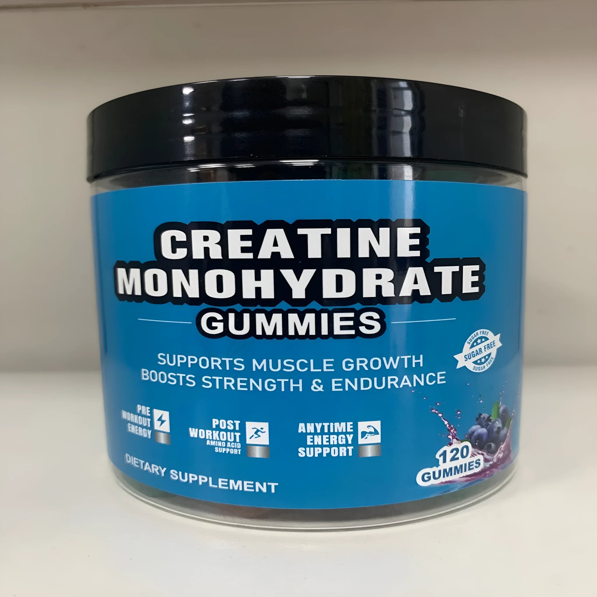 Bottle of raspberry-flavoured creatine monohydrate supplement gummies containing 120 tablets.