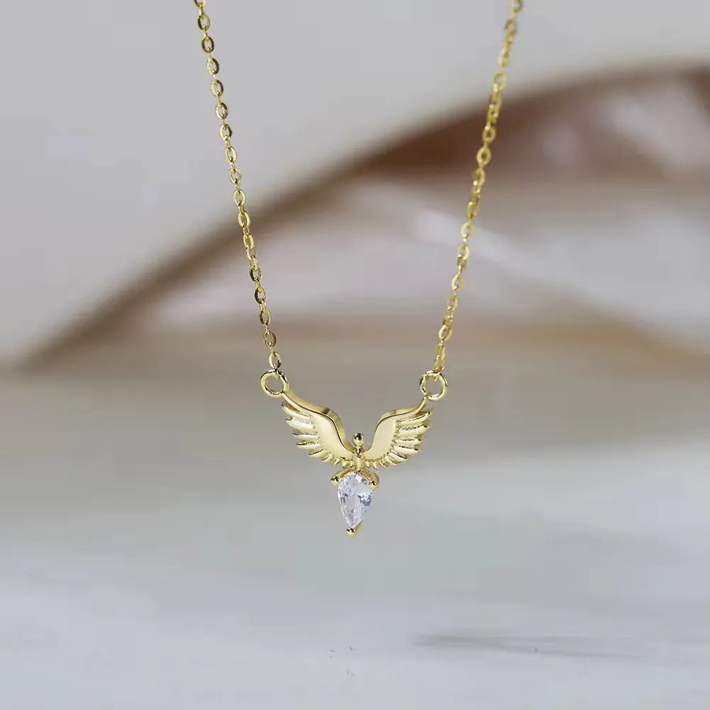 Close-up of a 925 silver eagle pendant on an adjustable O-ring chain necklace with an electroplated finish.
