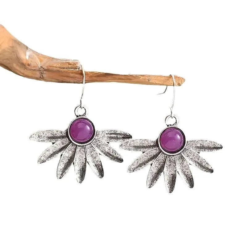 Purple resin Bohemian earrings with floral design and animal zodiac elements