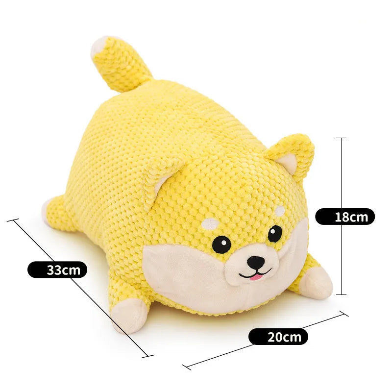 Plush calming dog toy with pillow shape, textured surface, and squeakers inside