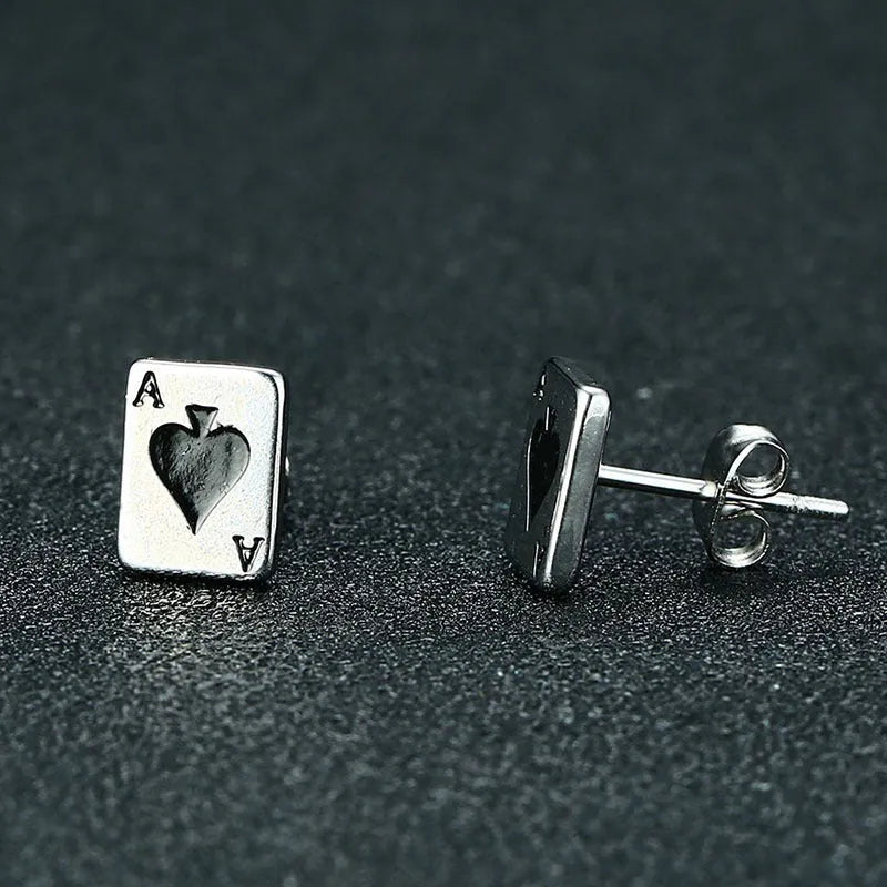 Small black peach A stud earrings in titanium steel with quadrilateral geometric punk style, shown as a pair.
