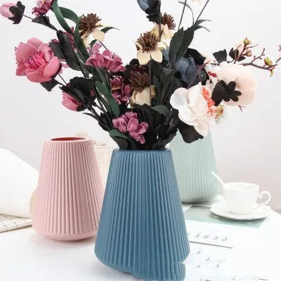Melamine plastic colourful decorative flower vase measuring 16x20cm in blue, green, pink, or white options