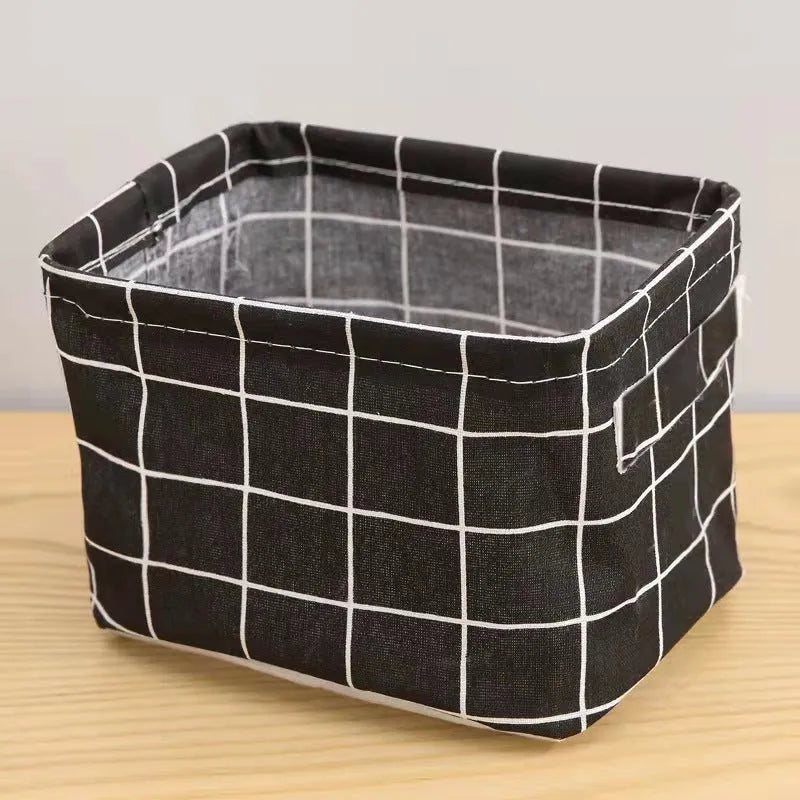 Foldable Oxford cloth desktop storage basket, 20x14x16cm, shown in a pastoral pattern from sixteen colour options.