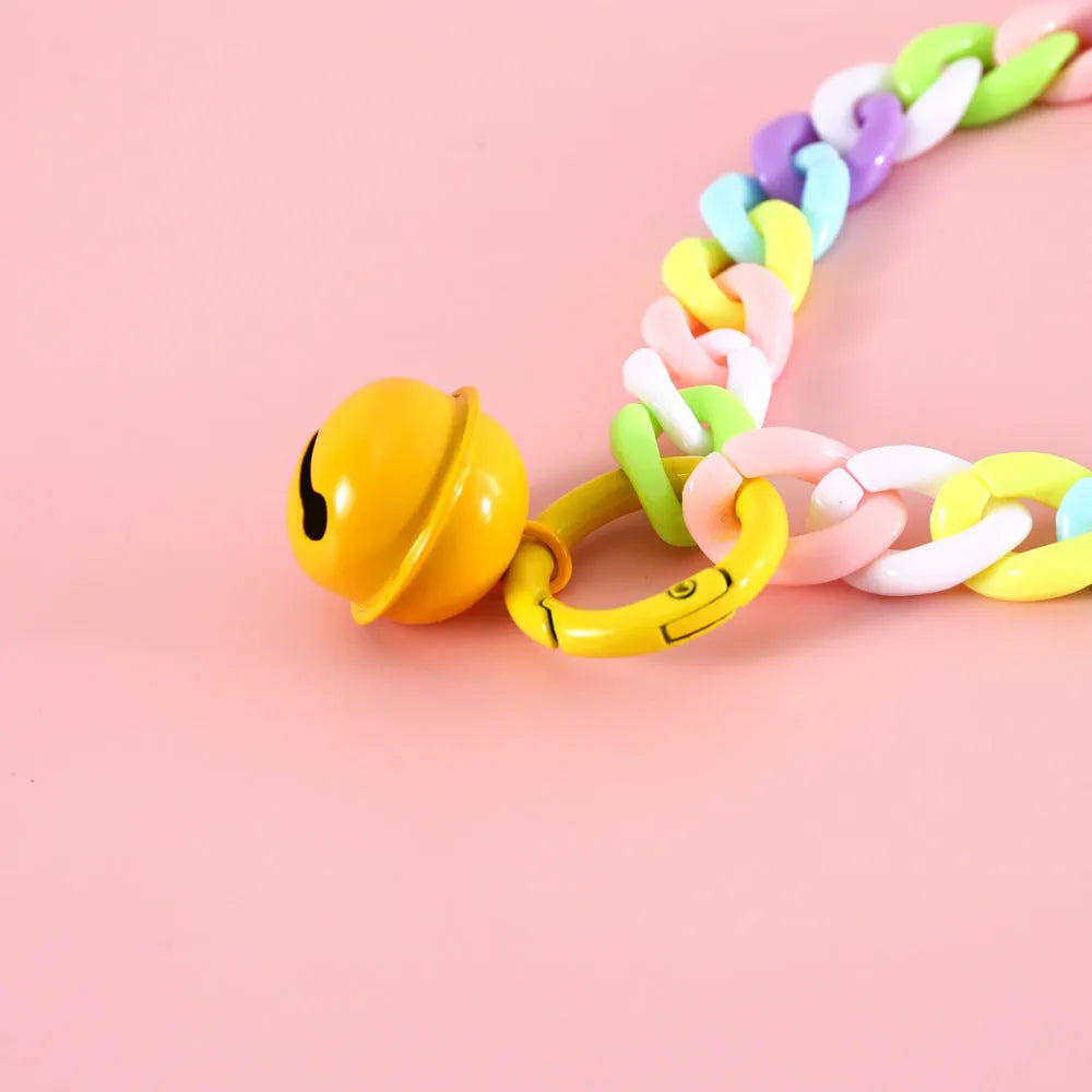 A macaron candy coloured plastic pet collar with chain detailing, shown in blue, pink, and mixed colour options.