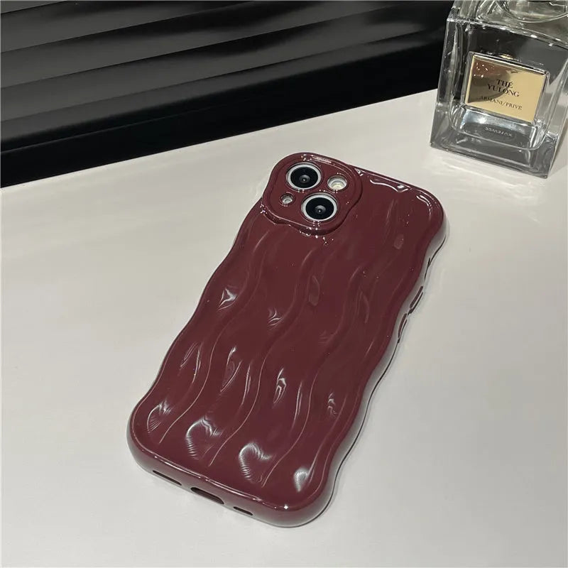Silicone phone case with water ripple pattern in wavy beige for iPhone 17 Pro Max, soft shell anti-falling design.