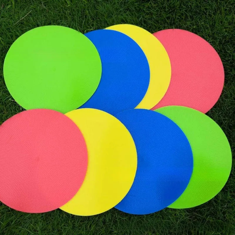 Soft circular football training target pad in bright colours measuring 23cm across