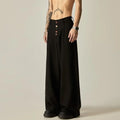 Men's solid black wide-leg casual trousers with a vertical tube design on a mid-waist.