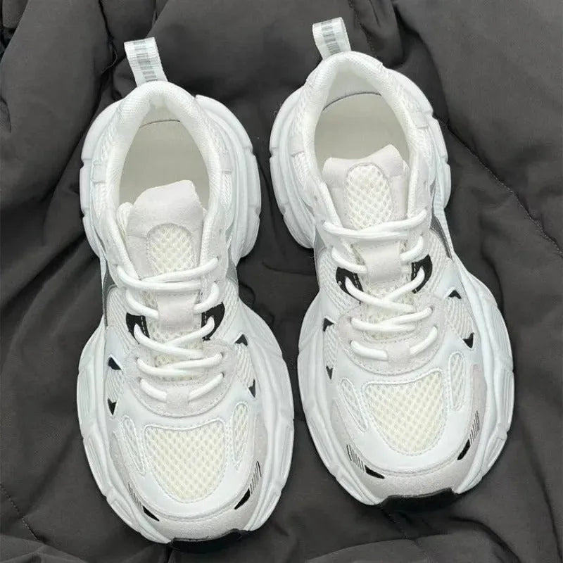 Beige mesh platform sports shoes with wedge heel, front lace-up design, and rubber sole