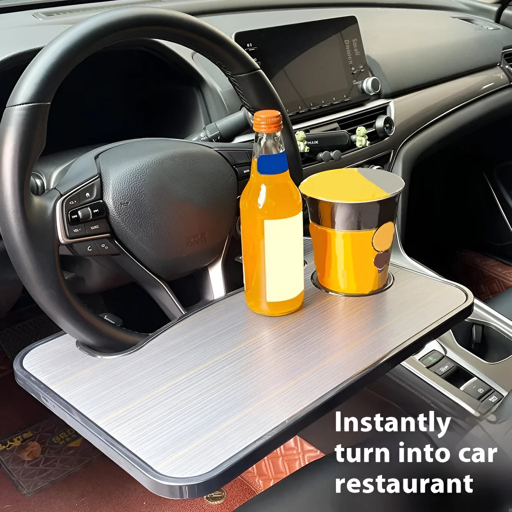 Foldable black car laptop table with built-in cup holder mounted on steering wheel