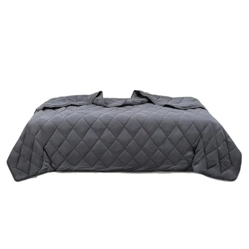 Solid grey polyester weighted blanket 152x203cm on a sofa with European style