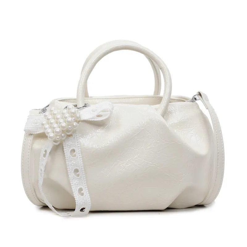 Portable solid colour cloud fashion shoulder small bag in urban simplicity bucket shape with slit pocket, PU material, beige colour