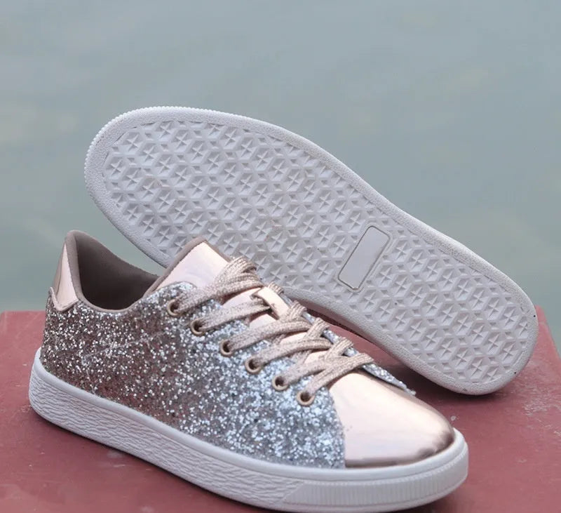Women's black sequinned lace-up casual shoes with a round toe and rubber sole, shown from the side.