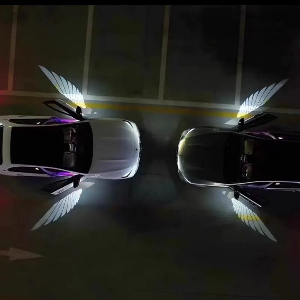 Car rearview mirror courtesy lamp with aluminium housing projecting white angel wings pattern