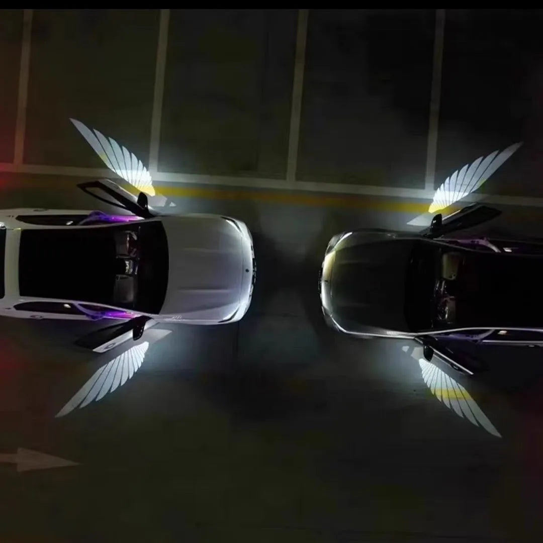 Car rearview mirror courtesy lamp with aluminium housing projecting white angel wings pattern