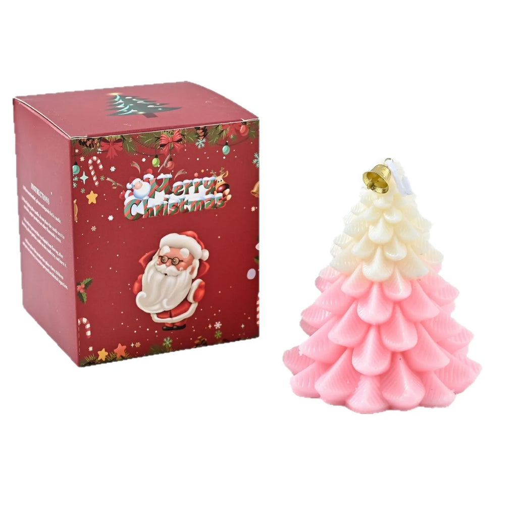 Christmas tree shaped soy wax aromatherapy candle in green on a table with festive home decoration