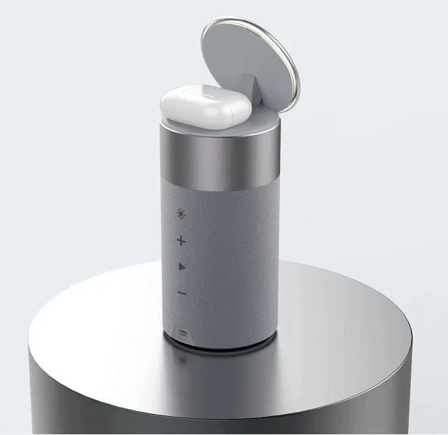 Magnetic wireless charger for earphone and cellphone in beige with button operation, on a desk
