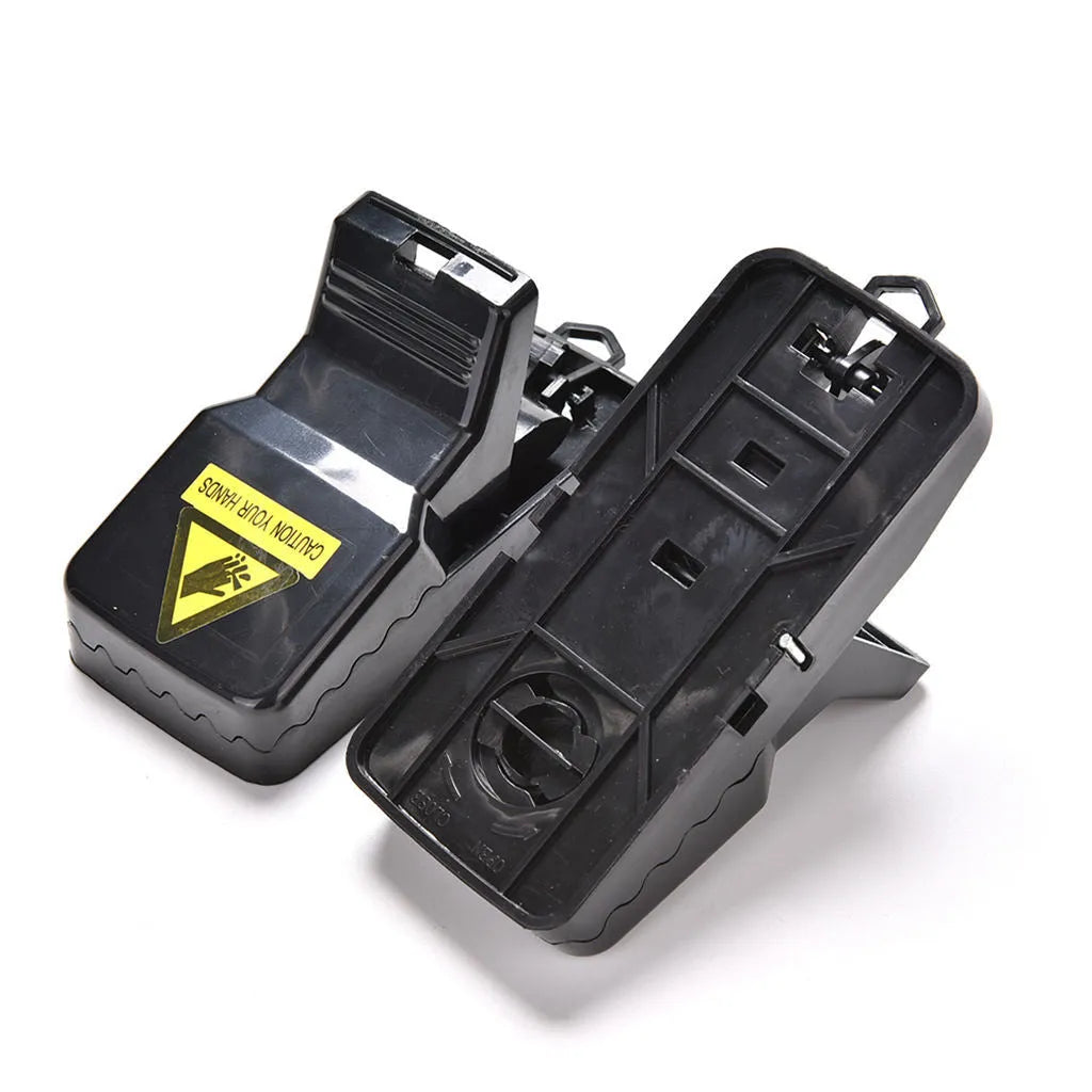 Six black plastic snap mousetraps showing dimensions and smooth surface.