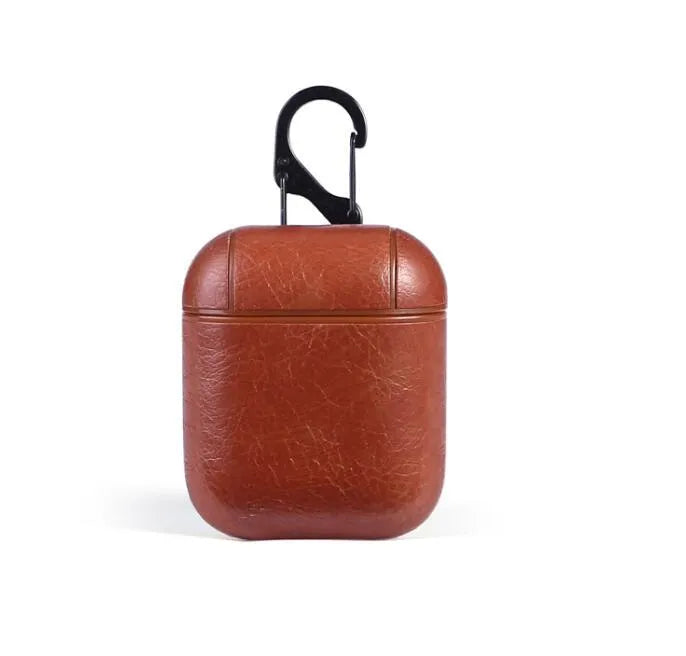 Genuine leather protective case for Apple Airpods charging box in black, brown, light brown, and red.